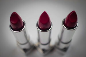 Lipstick trio with silver case and dark red lipstick.Dave Gevry 2022