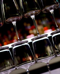 Upscale Bar photo of wine glasses stacked with background of bar Dave Gevry Photography 2024