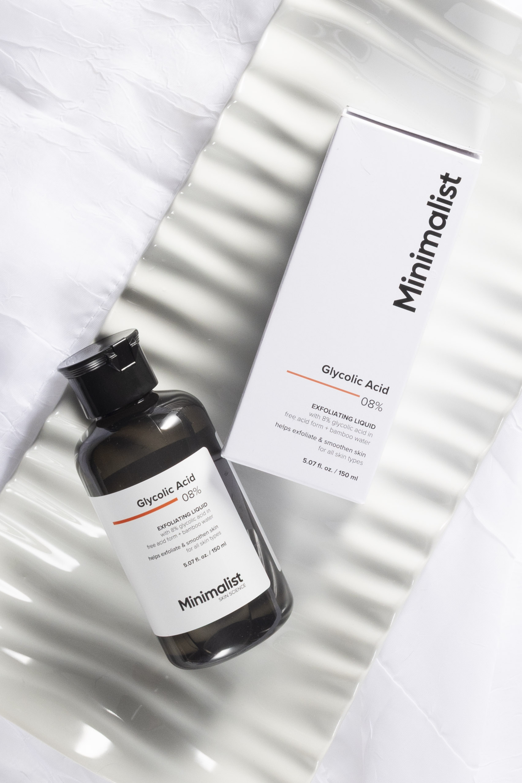 Minimalist skincare commercial product photography